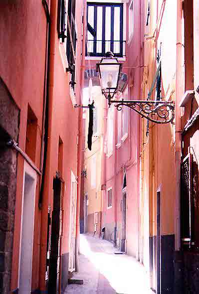 [colorful alley in Tuscan village]